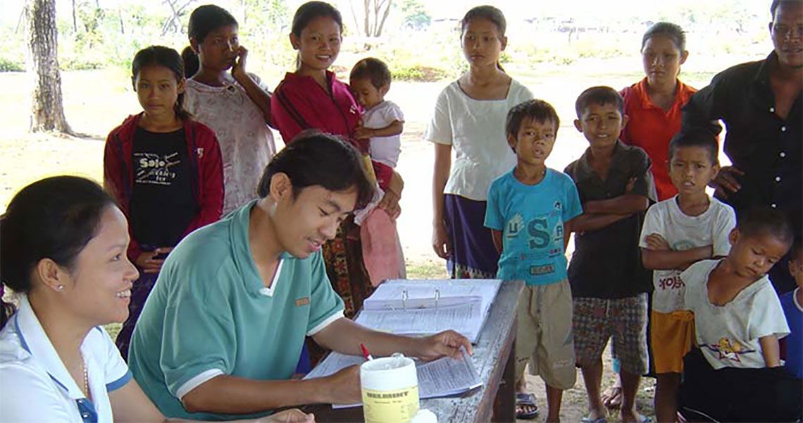 Medical workers assisting others